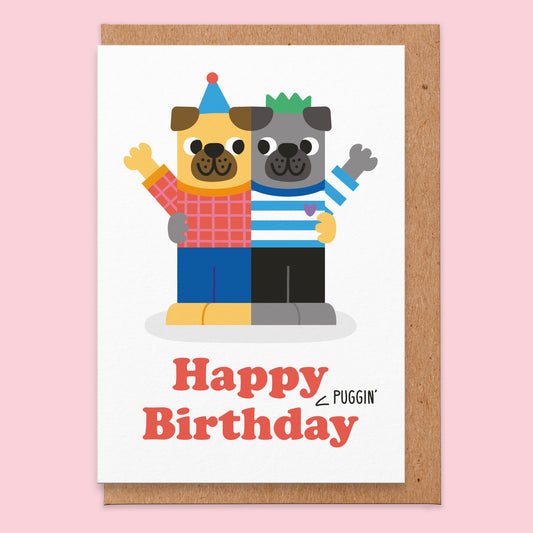 Birthday card that has an illustrationon of two pugs and the text reads happy pugging birthday