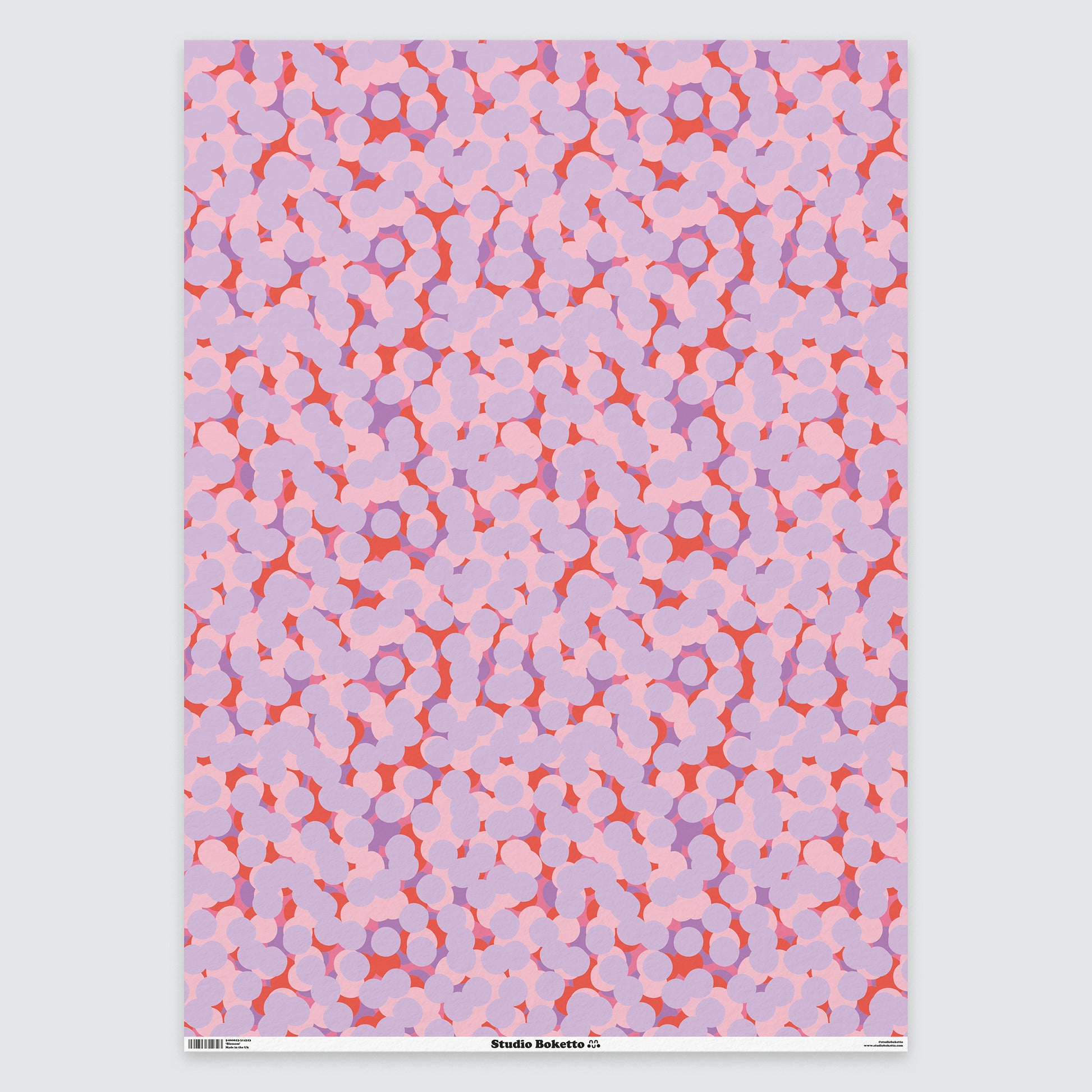 flat sheet of wrapping paper with cherry blossom design and pattern