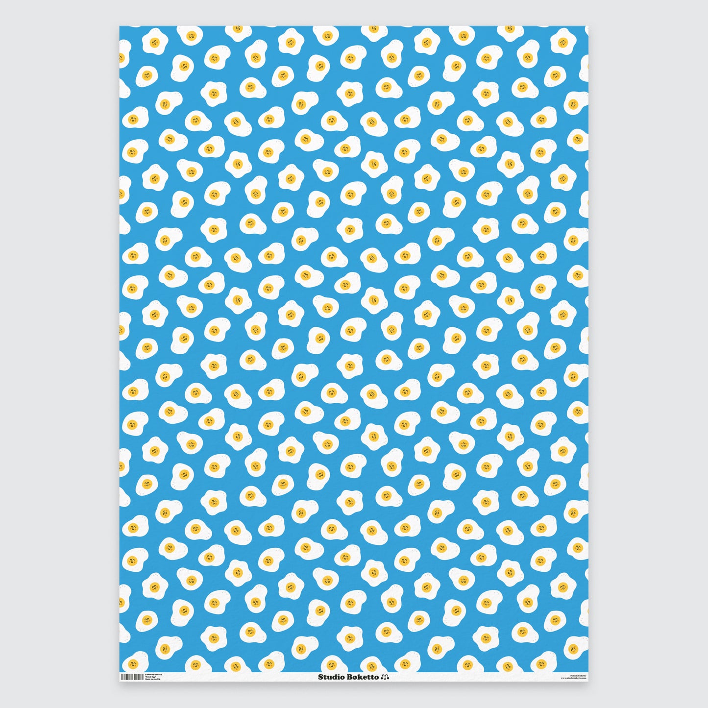 flat sheet of wrapping paper with eggs design and pattern