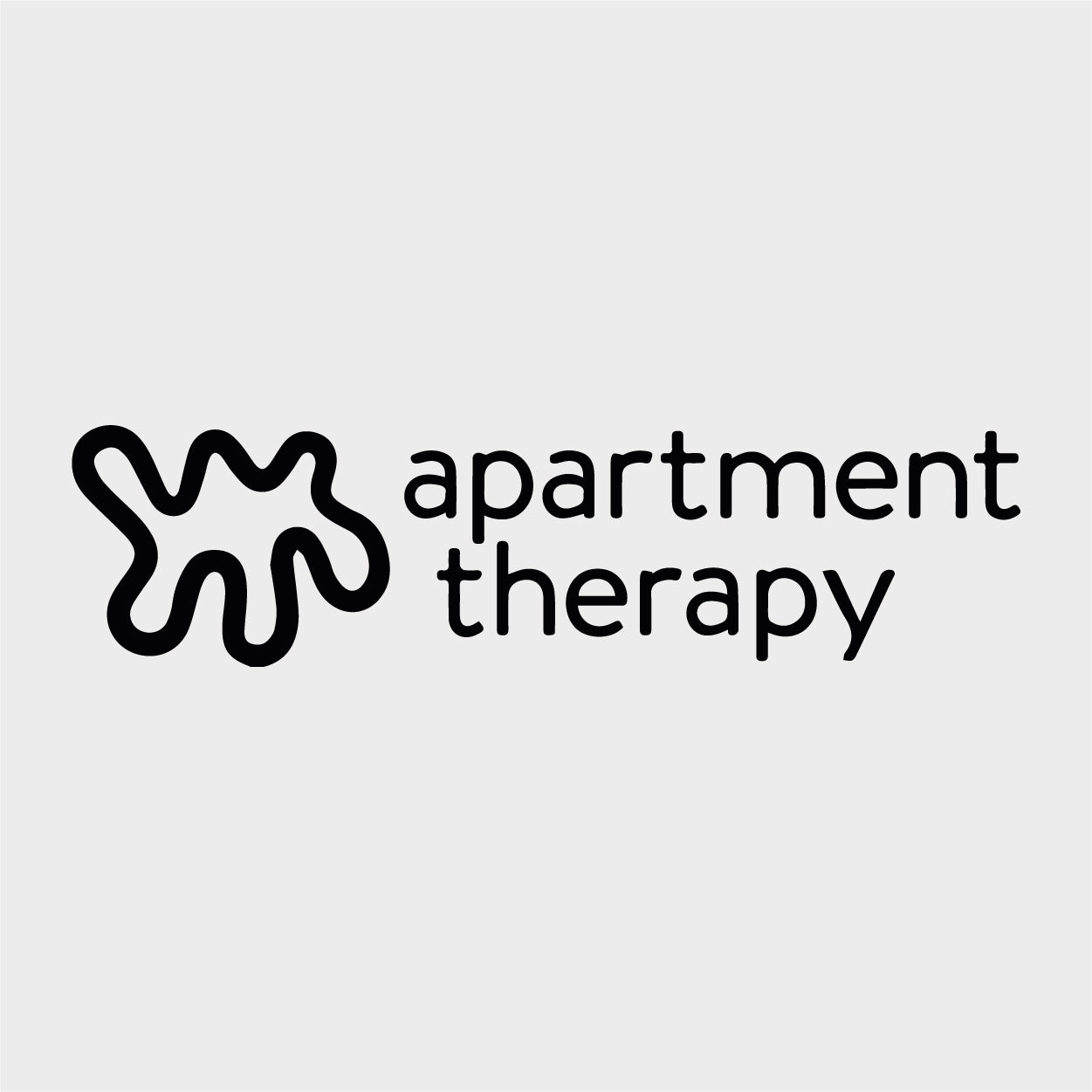 black apartment therapy logo on white background