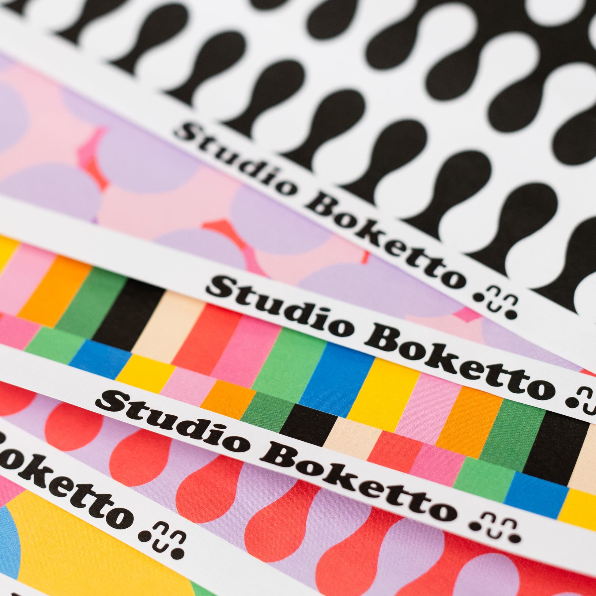 a collection of cool, colourful and modern wrapping paper by studio Boketto 