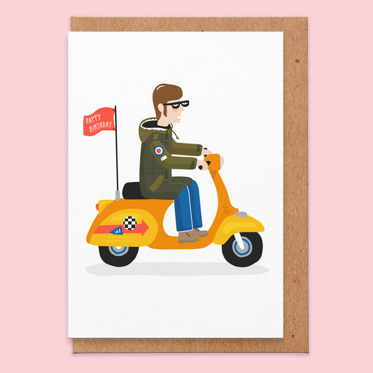 Birthday card with an illustration of a mod riding a scooter with a flag at the back that says happy birthday.