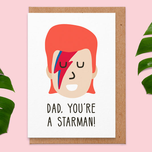 Father's Day card with an illustration of a rock legend with lightening makeup on his face, reads Dad, You're A Starman!