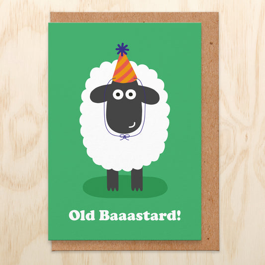 Green birthday card that has an illustration of a sheep wearing a party hat and reads old baaastard!