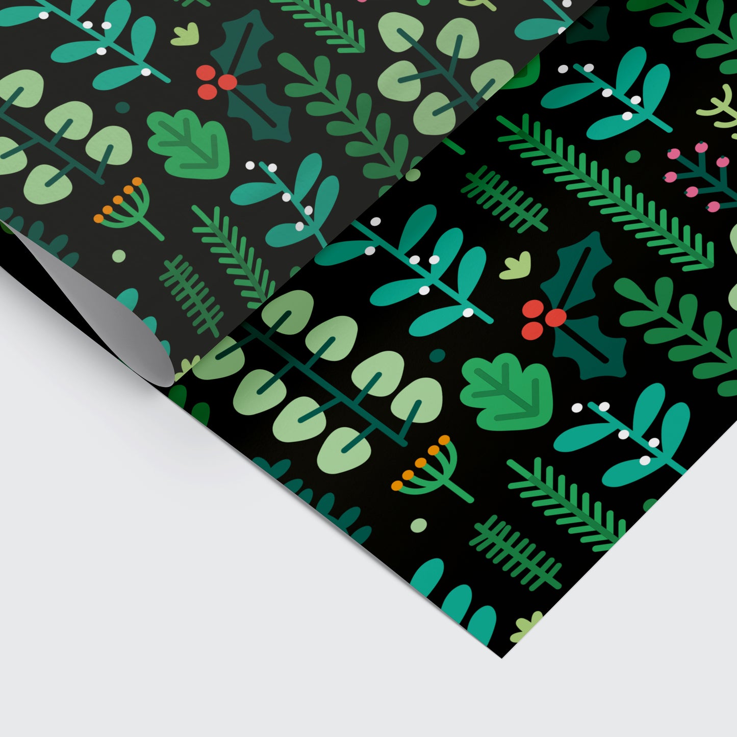 Christmas wrapping paper with botanical pattern on it