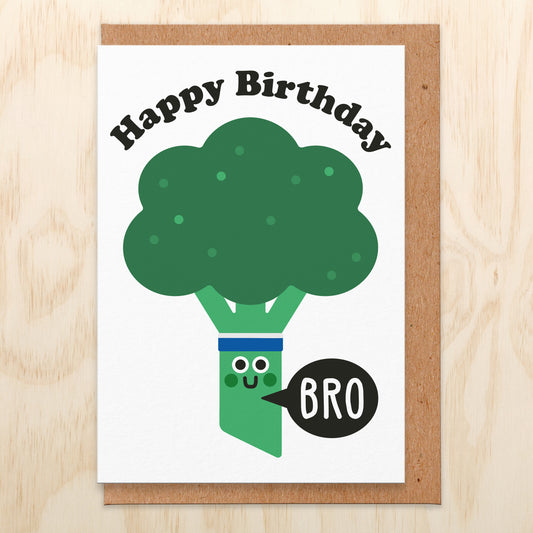 Birthday card that reads happy birthday bro. White background with an illustration of a broccoli.