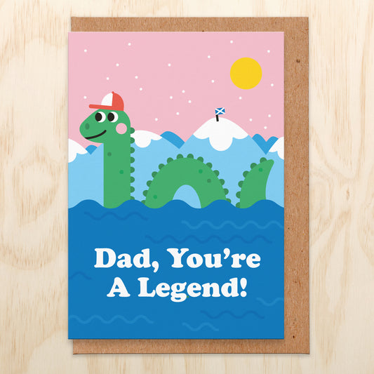 Father's Day card with an illustration of Loch Ness monster wearing a red and white baseball cap and reads Dad, You're A Legend!