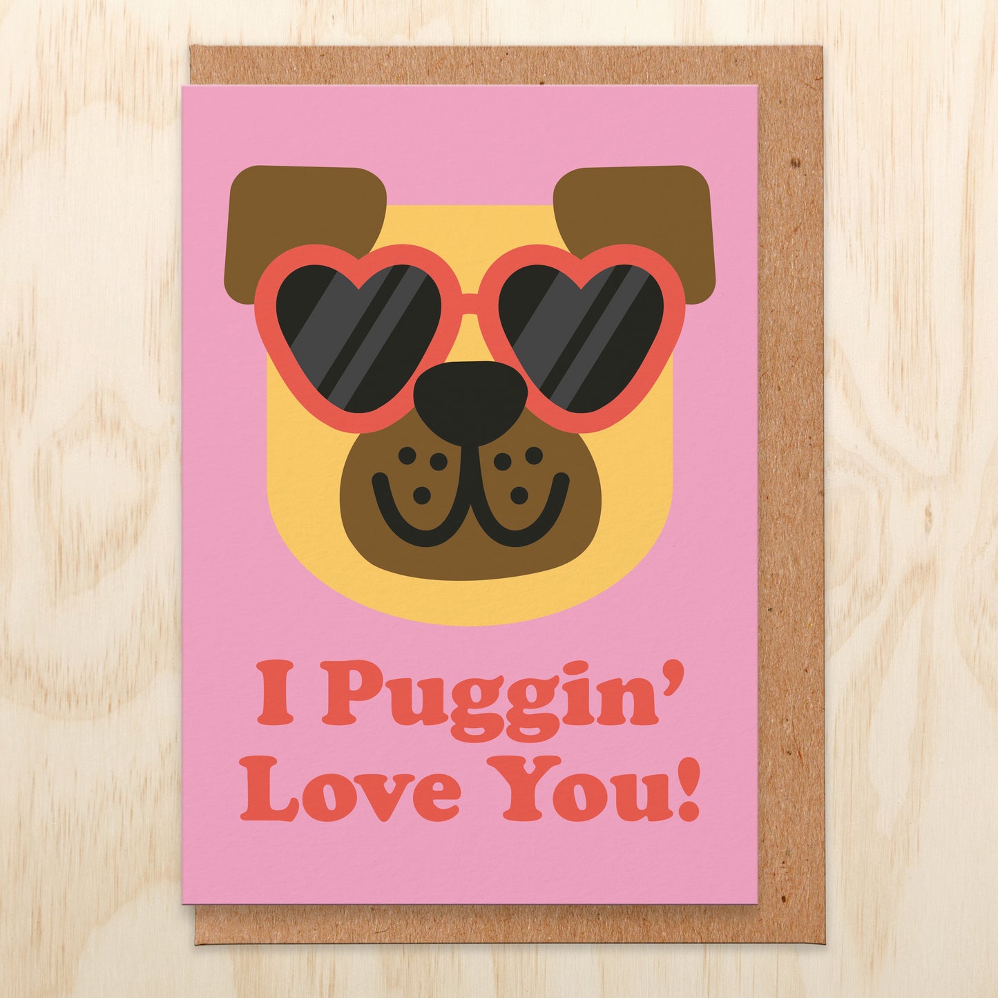 Love card that reads I puggin' love you! With an illustration of a pug wearing heart shaped sunglasses.