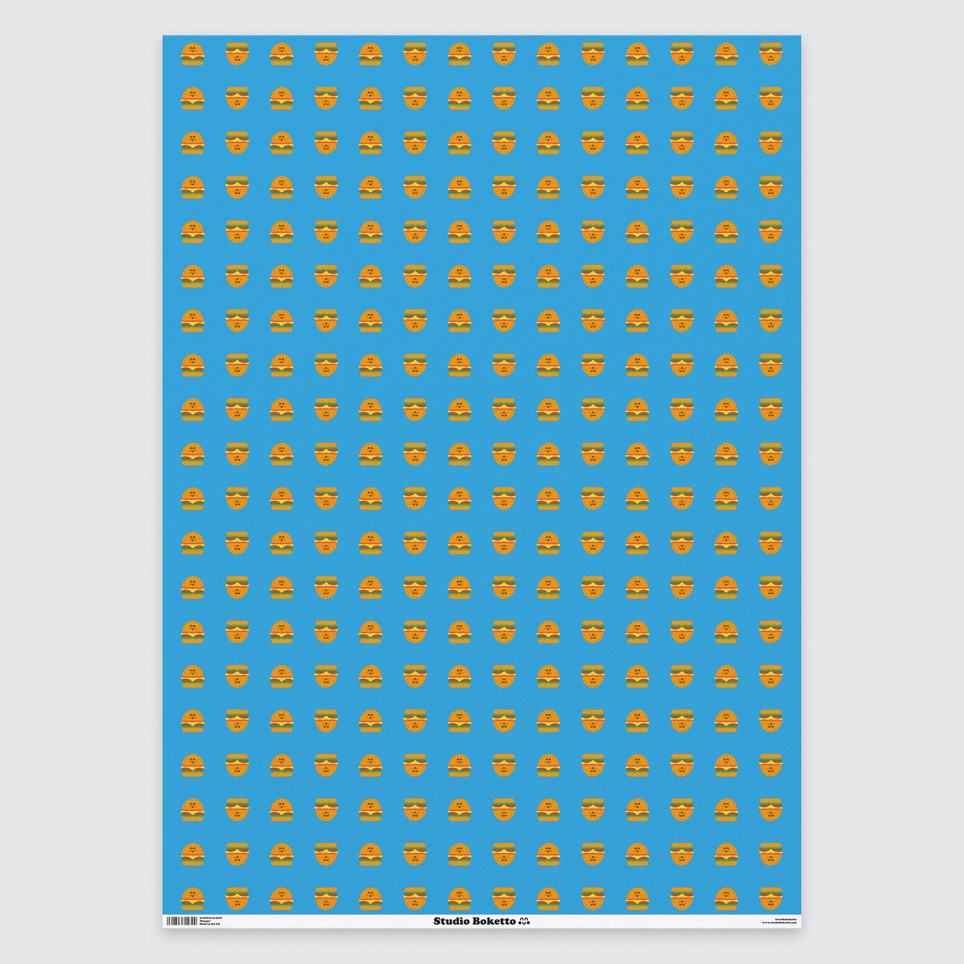 flat sheet of wrapping paper with burger design and pattern