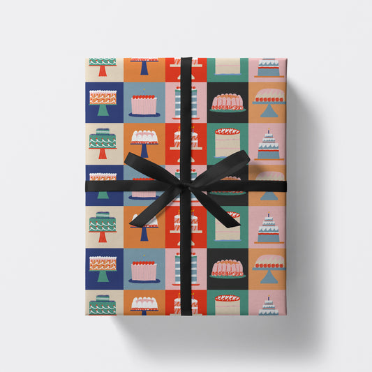 a square present wrapped in cakes pattern wrapping paper by studio boketto