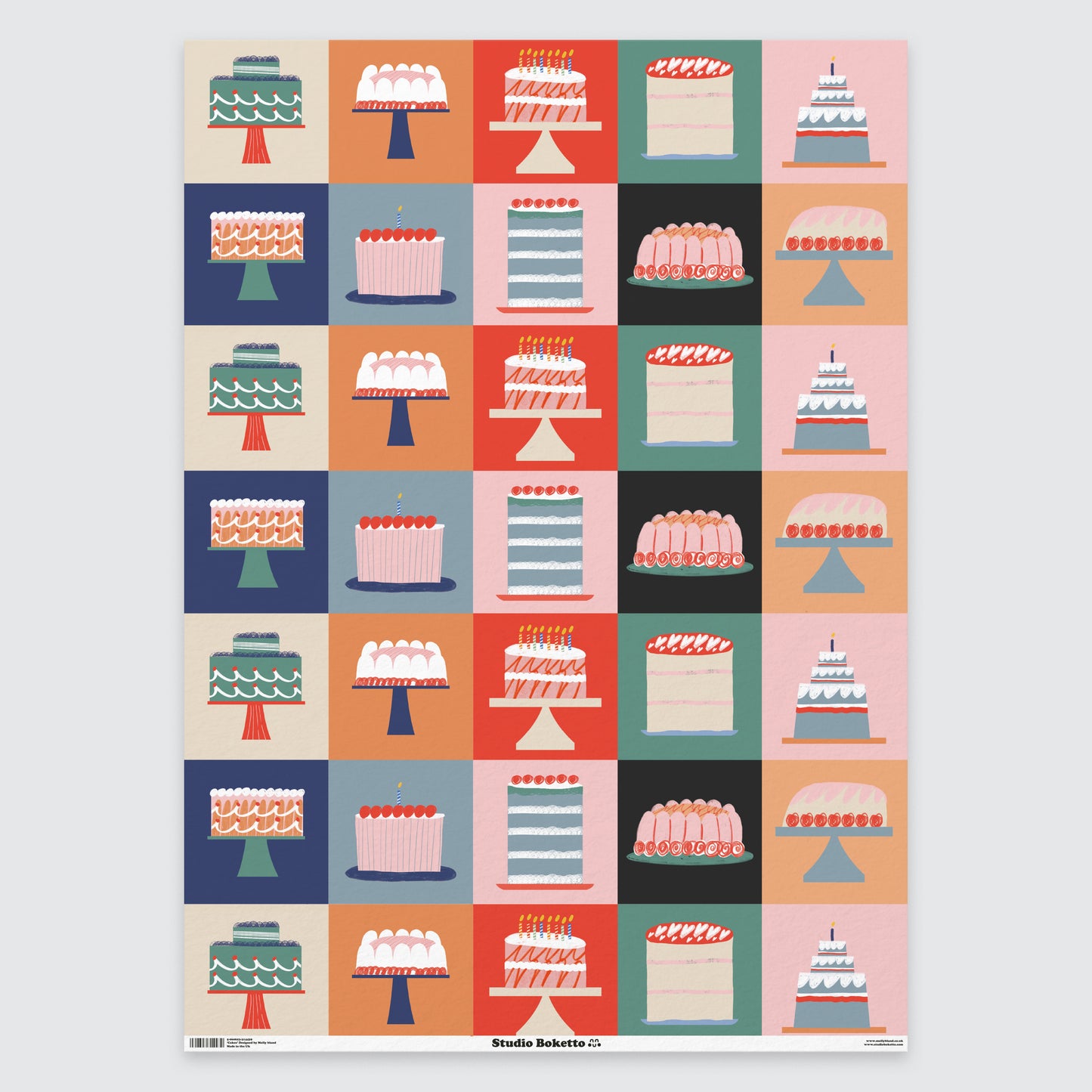 flat sheet of wrapping paper with birthday cakes design and pattern