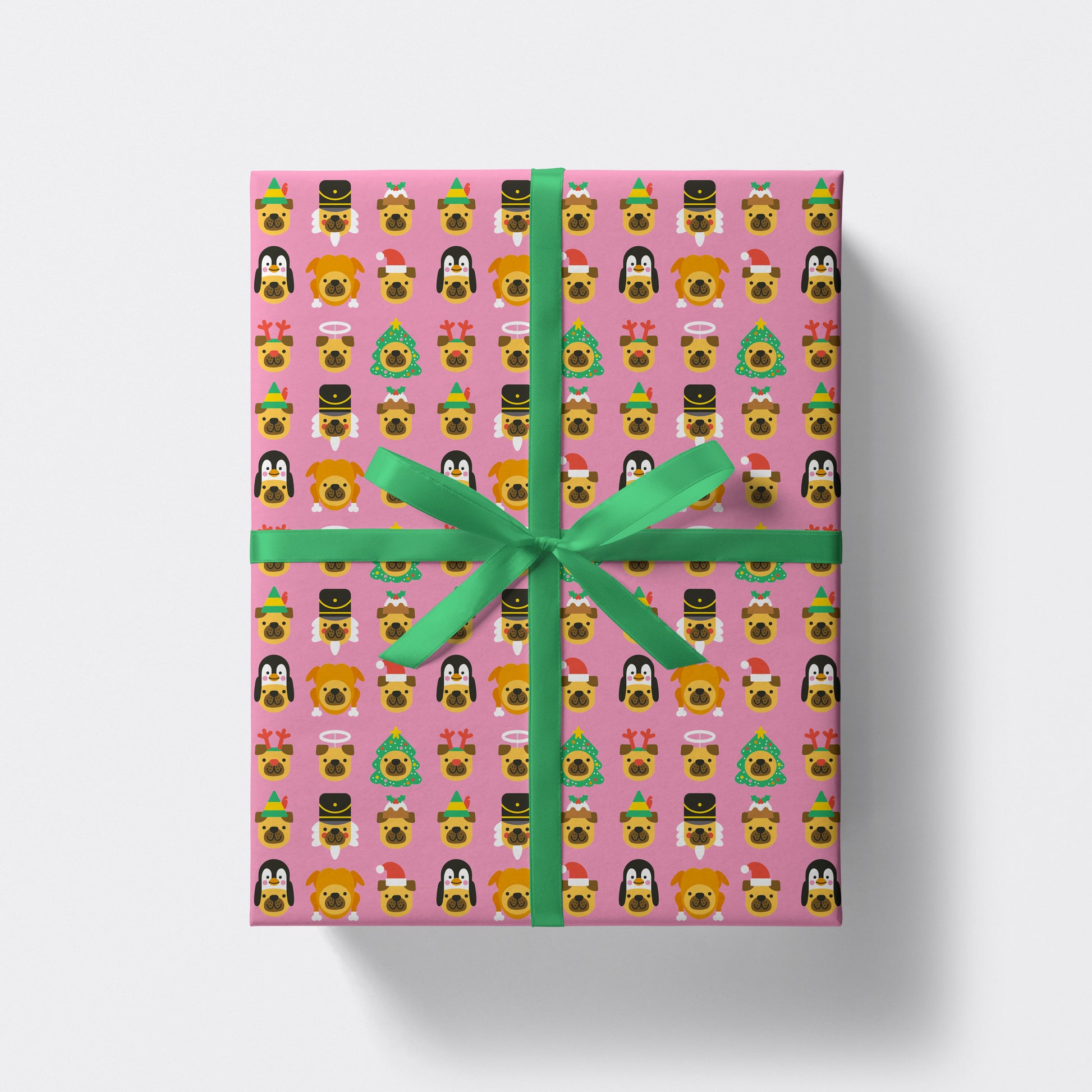 christmas present wrapped in dogs wearing christmas hats pattern wrapping paper by studio boketto