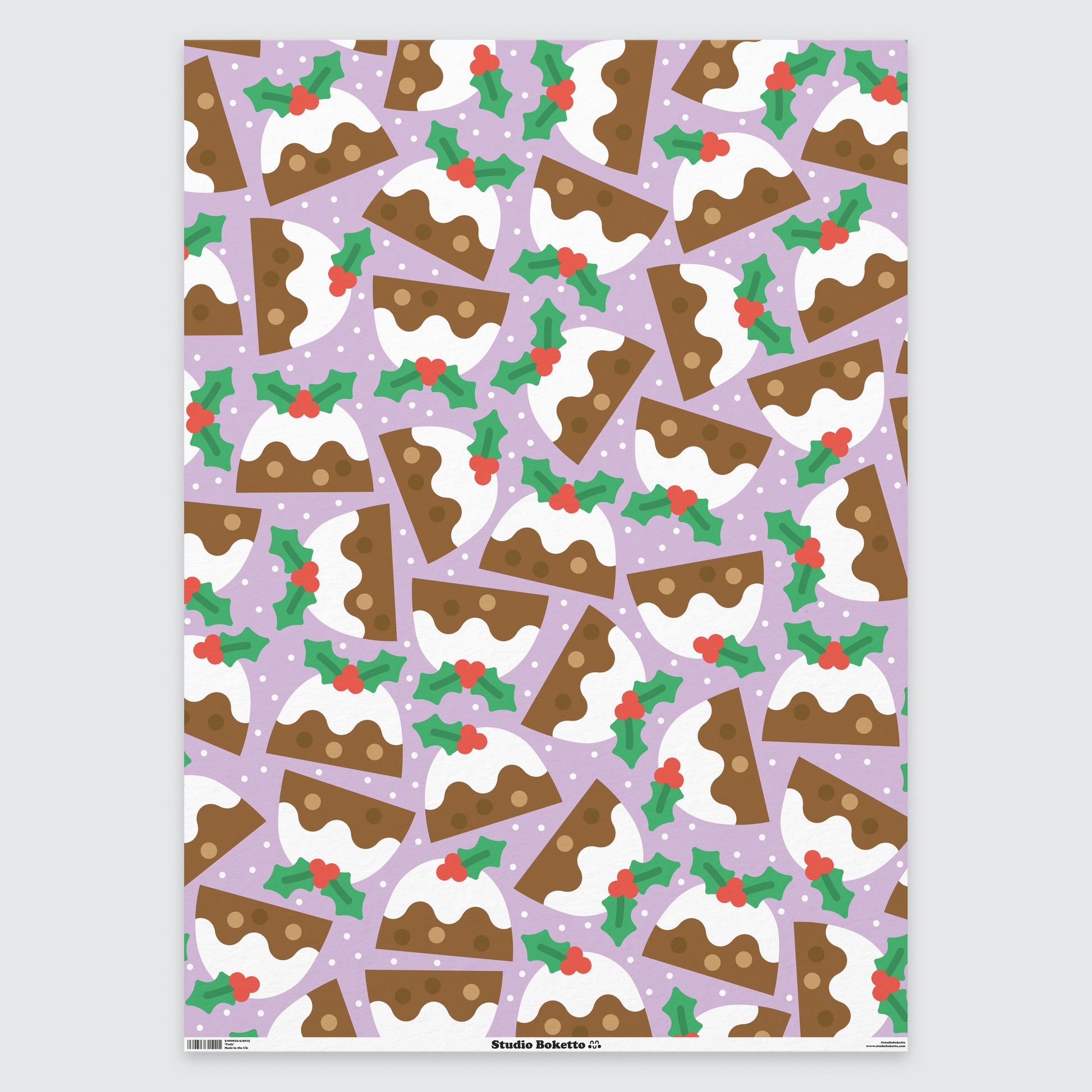 flat sheet of christmas wrapping paper with christmas pudding design and pattern