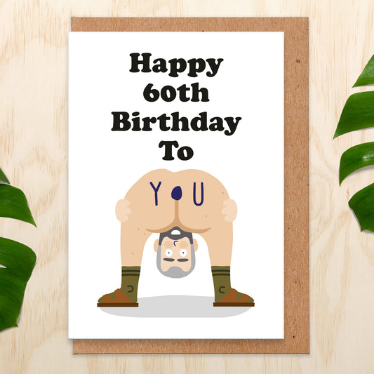 Birthday card that reads happy 60th birthday to you with a man bending over.