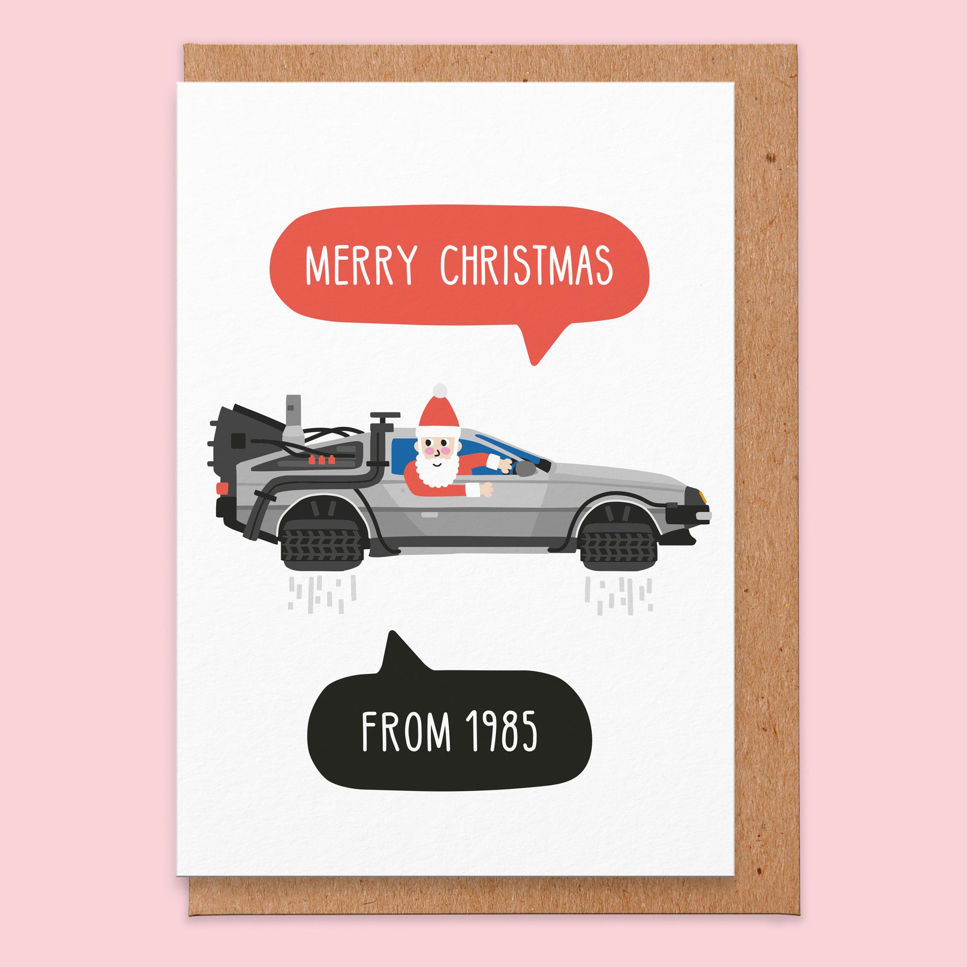 Christmas greetings card with santa driving a car from a sci fi movie and says Merry Christmas From 1985