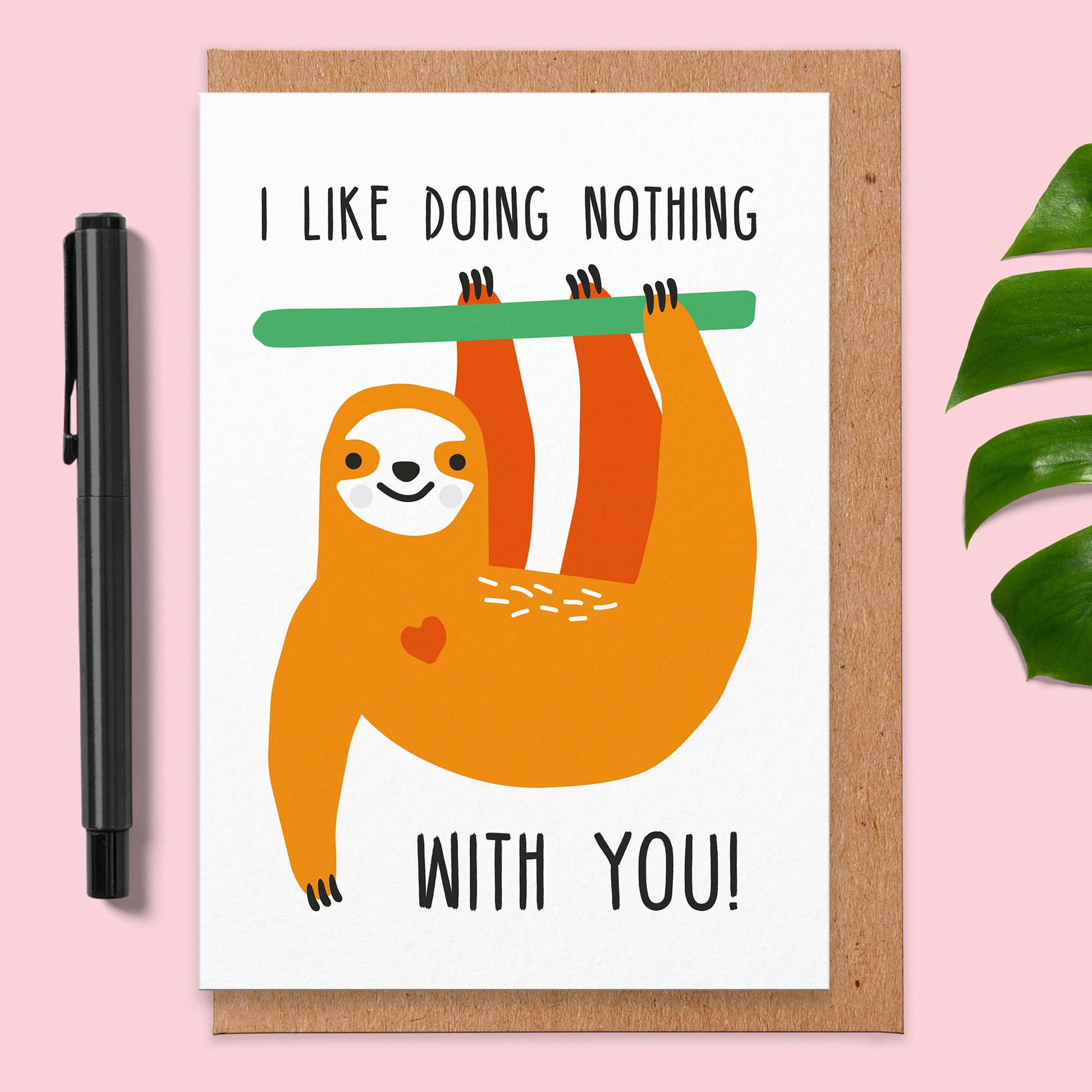 Love card with an illustration of a sloth. It reads I like doing nothing with you!