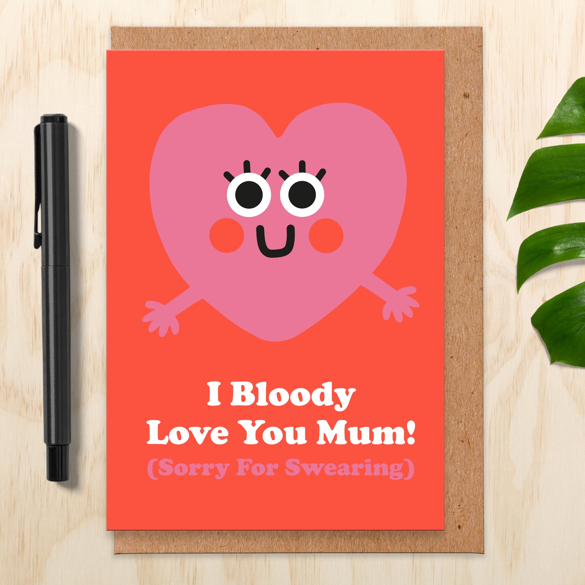 Mother's day card that says I Bloody Love You Mum! and has an illustration of a heart with hands