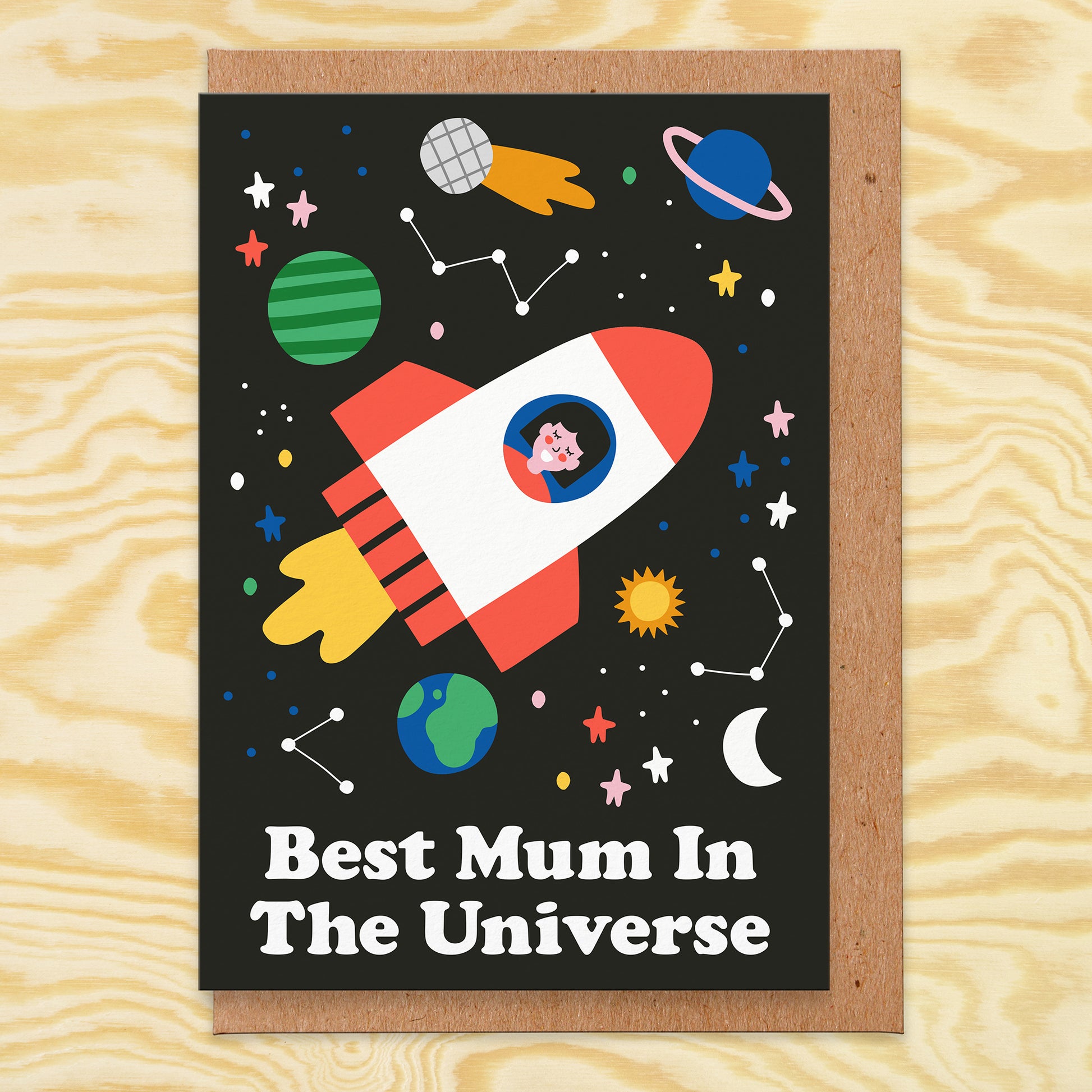 Greetings card with illustration of rocket in space and says best mum in universe.