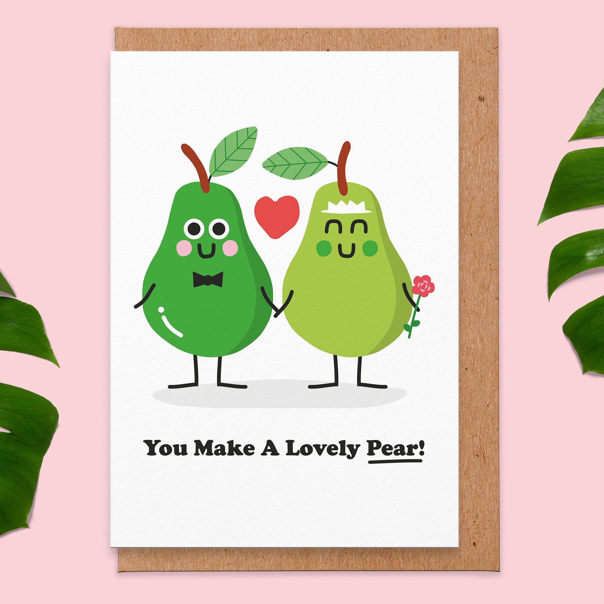 Wedding card with an illustration of two pears , one is a bride and the other is a groom. The text reads you make a lovely pear!