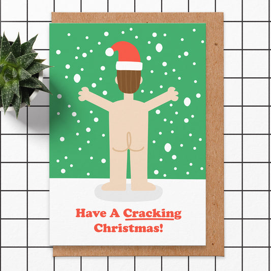 Christmas card that reads have a cracking christmas with an illustration of a naked man from the back.