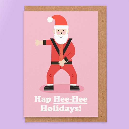 Christmas card with an illustration of Santa dressed as MJ and it reads hap her-hee holidays!